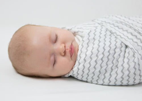 What is swaddling?