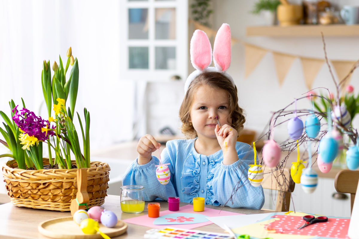 Little girl Easter crafting